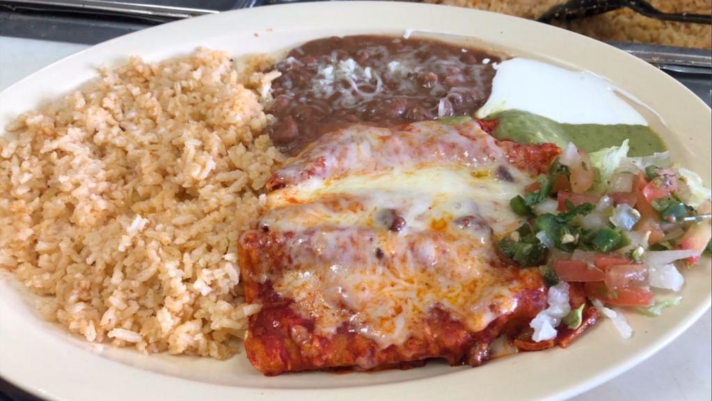 Platillo de Enchiladas · Order of three enchiladas, rice, beans,cheese, salsa, guacamole, sour cream, lettuce and tomato.