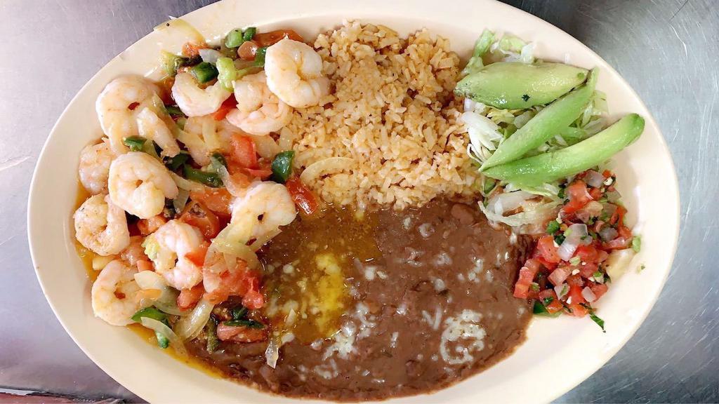 Camarones Rancheros · Shrimp sautéed with peppers and onions served with rice and beans