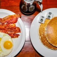 2. Breakfast · Hotcakes with sausage or bacon and two eggs.