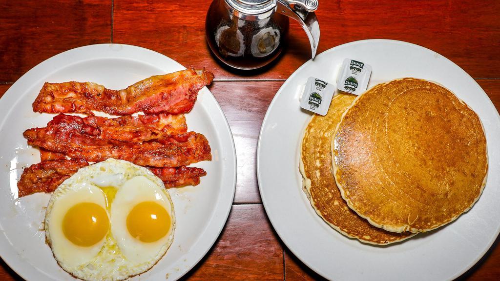 2. Breakfast · Hotcakes with sausage or bacon and two eggs.