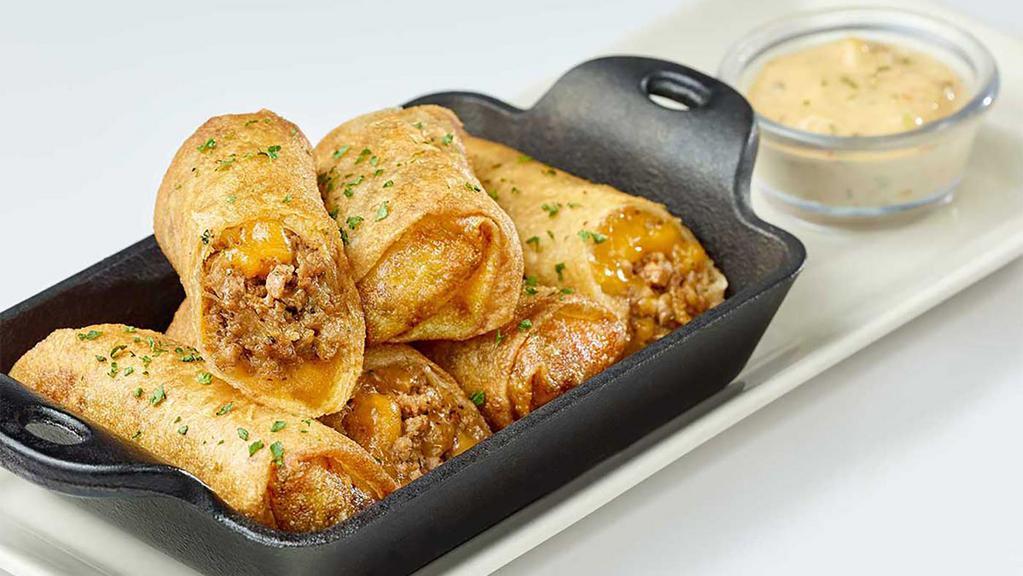 Cheeseburger Spring Rolls · Ground Certified Angus Beef®, Lots of Melted Cheese and Grilled Onions Rolled in a Crispy Wrapper