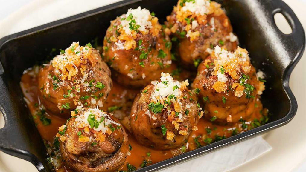 Stuffed Mushrooms · Fontina and Parmesan Cheese, Garlic and Herbs in a Wine Sauce