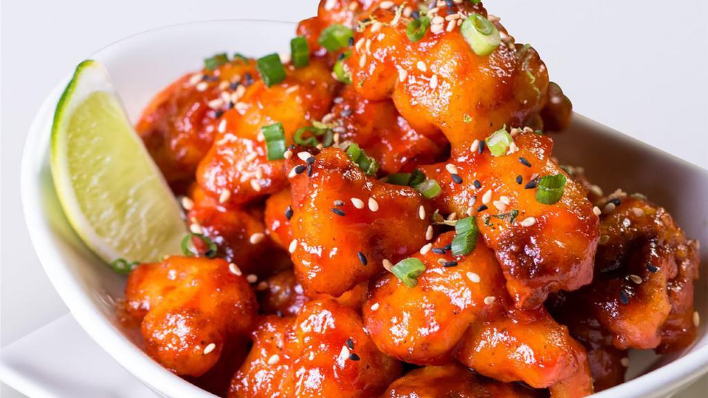 Korean Fried Cauliflower · Crispy Cauliflower Tossed with Sweet and Spicy Sauce, Toasted Sesame Seeds and Green Onion