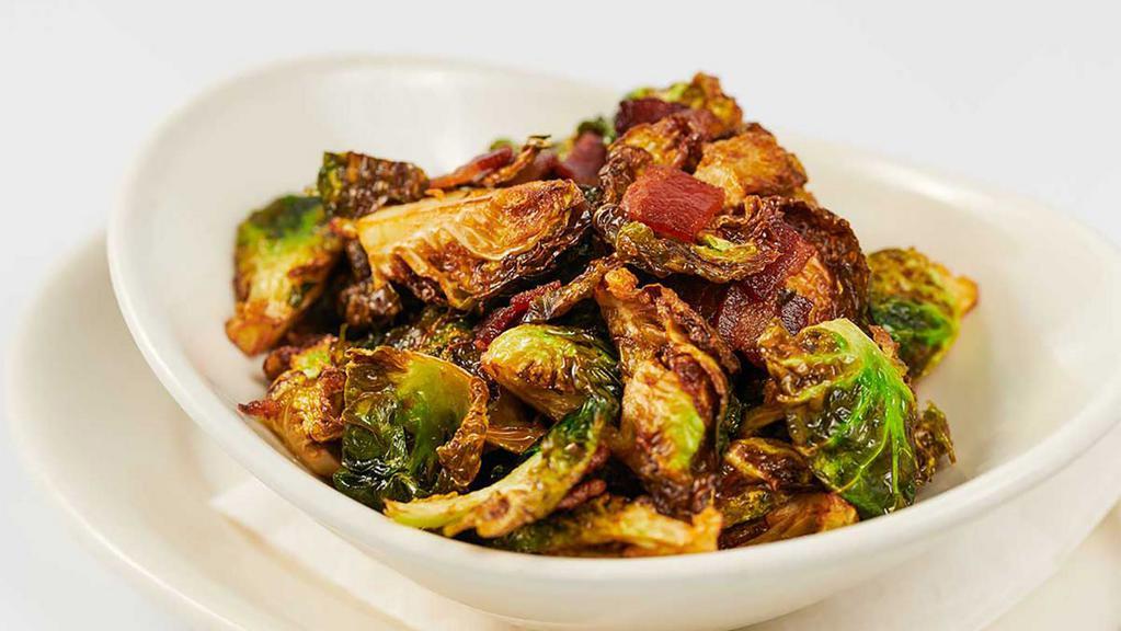 Crispy Brussels Sprouts · Roasted Brussels Sprouts and Crispy Leaves Tossed with Bacon and Vermont Maple Butter Glaze