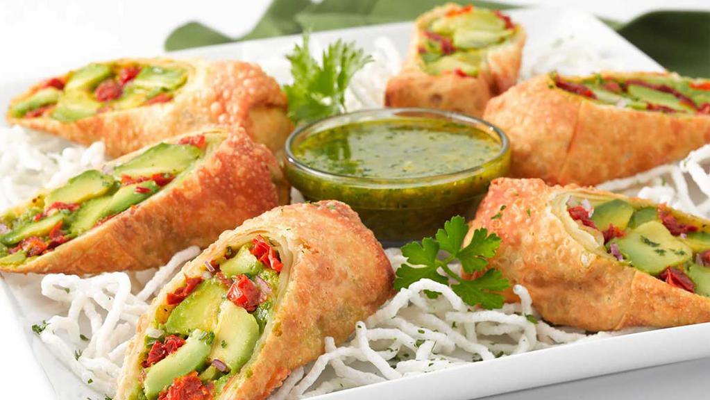 Avocado Eggrolls · Avocado, Sun-Dried Tomato, Red Onion and Cilantro Fried in a Crisp Wrapper. Served with a Tamarind-Cashew Dipping Sauce