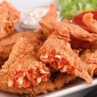 Buffalo Blasts® · Chicken, Cheese and Our Spicy Buffalo Sauce all Stuffed in a Spiced Wrapper and Fried until ...