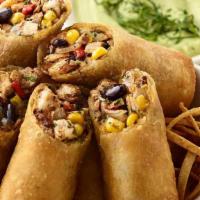 Tex Mex Eggrolls · Spicy Chicken, Corn, Black Beans, Peppers, Onions and Melted Cheese. Served with Avocado Cre...