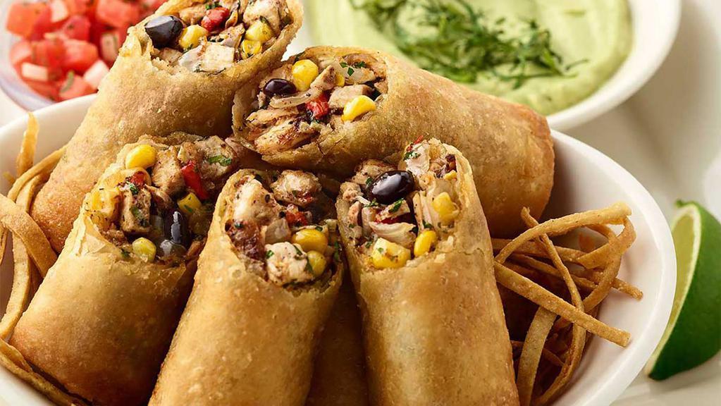 Tex Mex Eggrolls · Spicy Chicken, Corn, Black Beans, Peppers, Onions and Melted Cheese. Served with Avocado Cream and Salsa