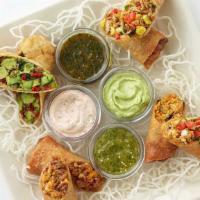 Eggroll Sampler · A Variety of All of Our Rolls with Avocado, Tex Mex, Cheeseburger Spring Rolls and Chicken T...