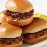 Roadside Sliders · Bite-Sized Burgers on Mini-Buns Served with Grilled Onions, Pickles and Ketchup