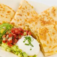 Quesadilla With Chicken · Grilled Flour Tortilla Filled with Melted Cheese, Green Onions and Chiles. Garnished with Gu...