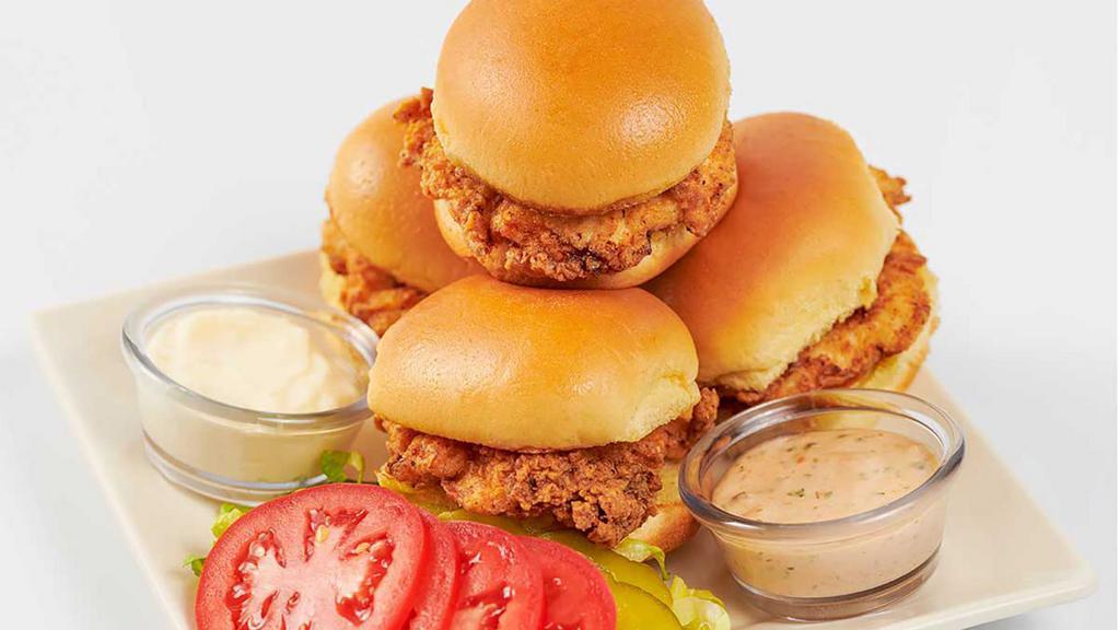 Southern Fried Chicken Sliders With French Fries · Crispy Fried Chicken Breast on Mini-Buns Served with Lettuce, Tomato and Pickles