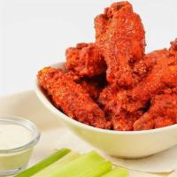 Buffalo Wings With French Fries · Fried Wings Covered in Hot Sauce and Served with Blue Cheese Dressing and Celery Sticks