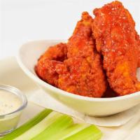 Buffalo Chicken Strips With French Fries · Fried Chicken Strips Covered in Hot Sauce and Served with Blue Cheese Dressing and Celery St...
