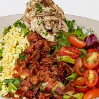 Cobb Salad · Chicken Breast, Avocado, Blue Cheese, Bacon, Tomato, Egg and Mixed Greens Tossed in Our Vina...
