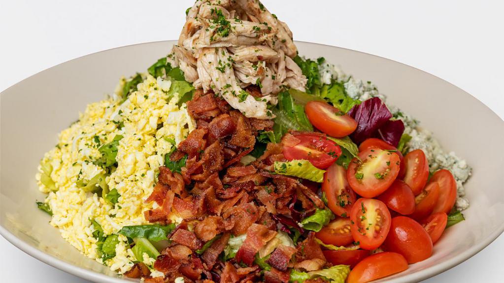 Cobb Salad · Chicken Breast, Avocado, Blue Cheese, Bacon, Tomato, Egg and Mixed Greens Tossed in Our Vinaigrette