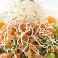 Chinese Chicken Salad · Chicken Breast, Rice Noodles, Lettuce, Green Onions, Almonds, Crisp Wontons, Bean Sprouts, O...