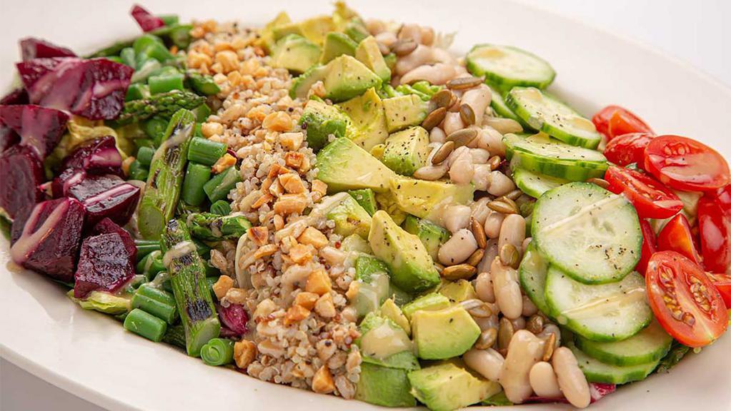 Vegan Cobb Salad · Crisp Lettuce, Grilled Asparagus, Avocado, Roasted Beets, Green Beans, Tomato, Cucumber, Carrot, Quinoa, Farro, Almonds and Toasted Pepitas with House Vinaigrette
