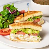 Renee'S Chicken-Almond Salad Sandwich Special · One-Half of a Chicken-Almond Salad Sandwich, a Cup of Our Soup and a Small Green Salad