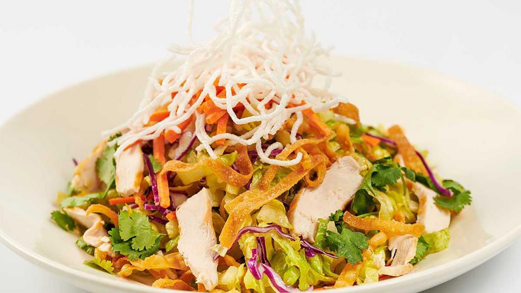 Lunch Chinese Chicken Salad · Chicken Breast, Rice Noodles, Lettuce, Green Onions, Almonds, Crisp Wontons, Bean Sprouts, Orange and Sesame Seeds. Tossed in Our Special Chinese Plum Dressing