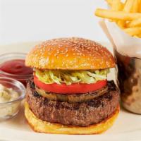 Classic Burger · A Chop House Hamburger. Served with a Slice of Grilled Onion, Lettuce and Tomato