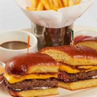 French Dip Cheeseburger · Charbroiled Cheeseburger Served on a Toasted Brioche Roll with Grilled Onions, Sriracha Mayo...