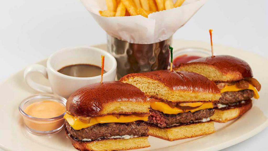 French Dip Cheeseburger · Charbroiled Cheeseburger Served on a Toasted Brioche Roll with Grilled Onions, Sriracha Mayo and Au Jus for Dipping