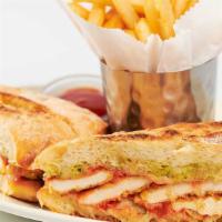 Chicken Parmesan Sandwich · Tender Chicken Lightly Coated in Parmesan Breadcrumbs, Tomato Sauce and Melted Cheese on a F...