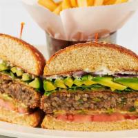 Veggie Burger · Our Housemade Crispy Veggie “Burger” with Brown Rice, Farro, Mushrooms, Black Beans and Onio...