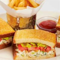 Chicken Salad Sandwich · Housemade with Roasted Almonds, Lettuce, Tomato and Mayonnaise. Served on Grilled Brioche Br...