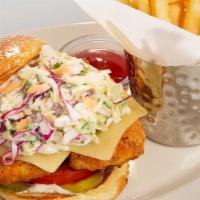 Fried Chicken Sandwich · Chicken Breast Fried Crisp with Cheese, Cole Slaw, Pickles and Mayonnaise. Served on a Grill...