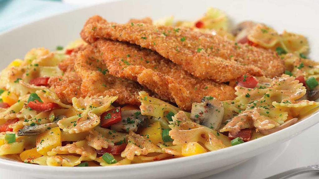Louisiana Chicken Pasta · Parmesan Crusted Chicken Served Over Pasta with Mushrooms, Peppers and Onions in a Spicy New Orleans Sauce