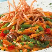 Spicy Chicken Chipotle Pasta · Penne Pasta, Honey Glazed Chicken, Asparagus, Red and Yellow Peppers, Peas, Garlic and Onion...