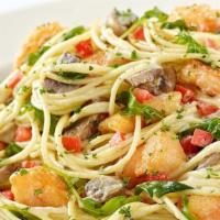 Bistro Shrimp Pasta · Crispy Battered Shrimp, Fresh Mushrooms, Tomato and Arugula Tossed with Spaghetti and a Basi...