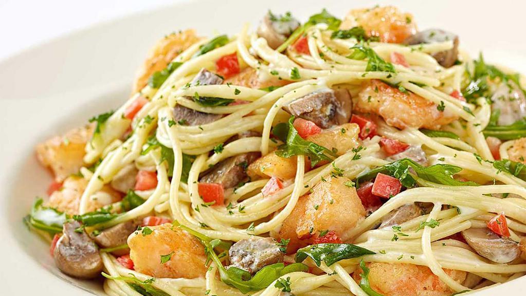 Bistro Shrimp Pasta · Crispy Battered Shrimp, Fresh Mushrooms, Tomato and Arugula Tossed with Spaghetti and a Basil-Garlic-Lemon Cream Sauce
