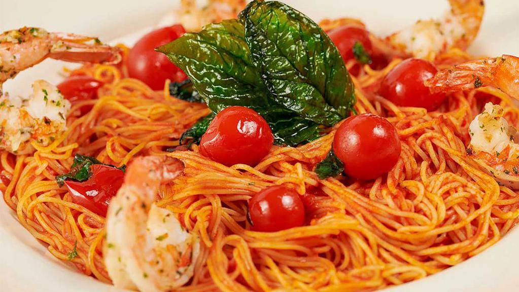 Shrimp With Angel Hair · Large Shrimp Sauteed with Tomatoes, Lemon, Garlic, Herbs and Fresh Basil on Top of Angel Hair Pasta with a Touch of Marinara Sauce
