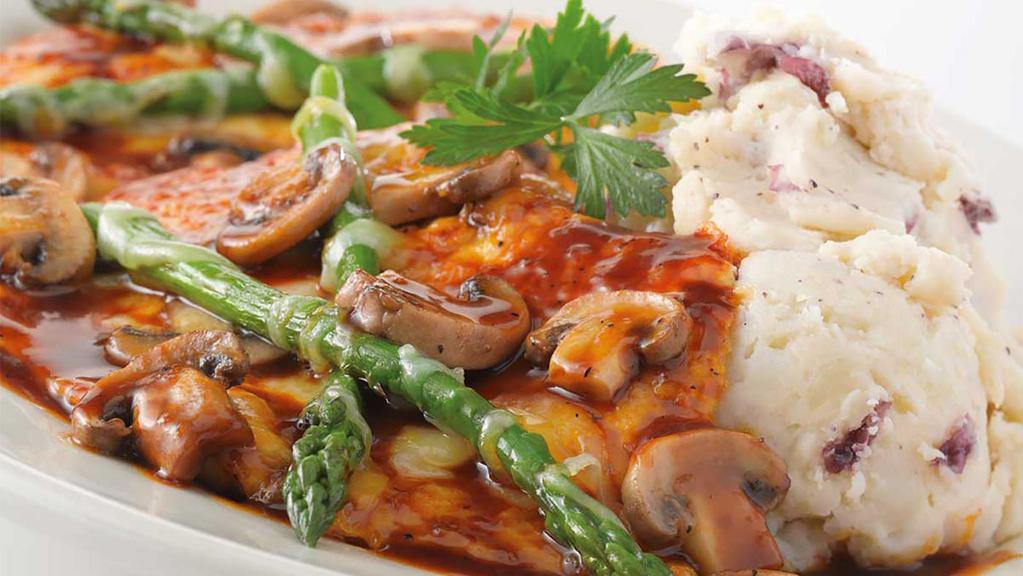 Chicken Madeira · Our most popular chicken dish! Sauteed Chicken Breast Topped with Fresh Asparagus and Melted Mozzarella Cheese. Covered with Fresh Mushroom Madeira Sauce and Served with Mashed Potatoes