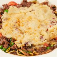 Shepherd'S Pie · Ground Beef, Carrots, Peas, Zucchini and Onions in a Delicious Mushroom Gravy Covered with a...