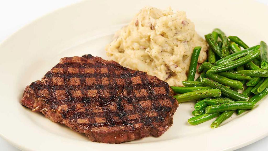 Grilled Rib-Eye Steak · Served with Mashed Potatoes and Green Beans