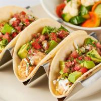 Skinnylicious® Chicken Soft Tacos · Three Soft Corn Tortillas Filled with Spicy Chicken, Avocado, Tomato, Onions, Cilantro and C...
