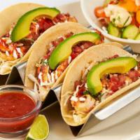 Skinnylicious® Shrimp Soft Tacos · Three Soft Corn Tortillas Filled with Shrimp, Avocado, Tomato, Onions, Cilantro and Crema. S...