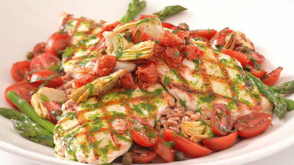 Tuscan Chicken · Grilled Chicken Breast with Tomatoes, Artichokes, Capers, Fresh Basil and Balsamic Vinaigrette. Served over Fresh Vegetables and Farro