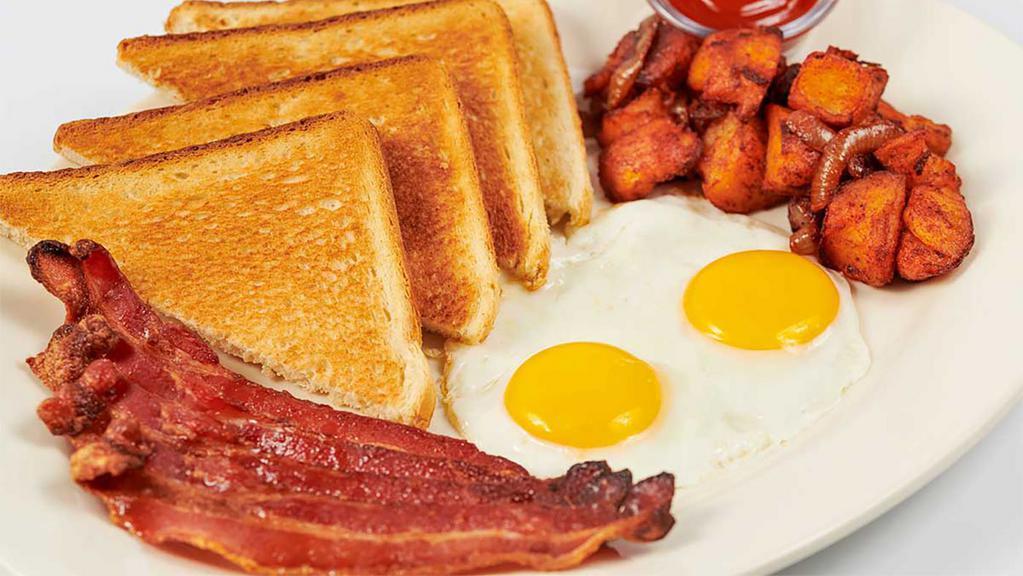 Farm Fresh Eggs With Old Smokehouse® Bacon · Two farm fresh eggs served with potatoes or tomatoes, toast, bagel, or English muffin.