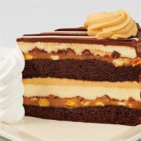 Reese'S® Peanut Butter Chocolate Cake Cheesecake · Reese's Peanut Butter Cups in Our Original Cheesecake with Layers of Delicious Fudge Cake an...