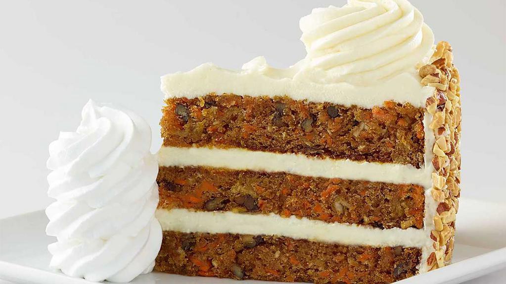 Carrot Cake · Deliciously Moist Layers of Carrot Cake and Our Famous Cream Cheese Icing