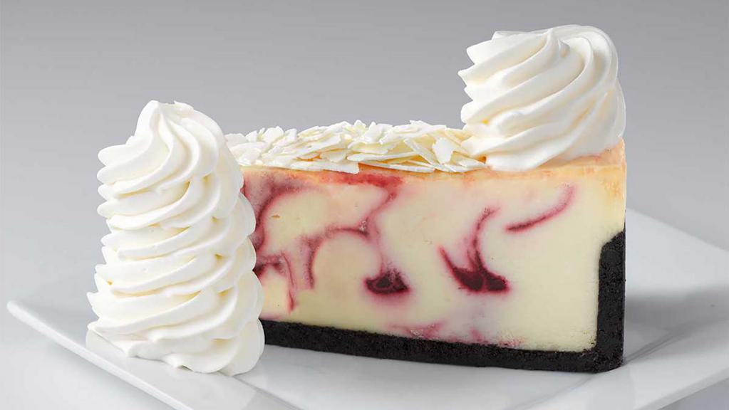 White Chocolate Raspberry Truffle® · Creamy Cheesecake Swirled with White Chocolate and Raspberry