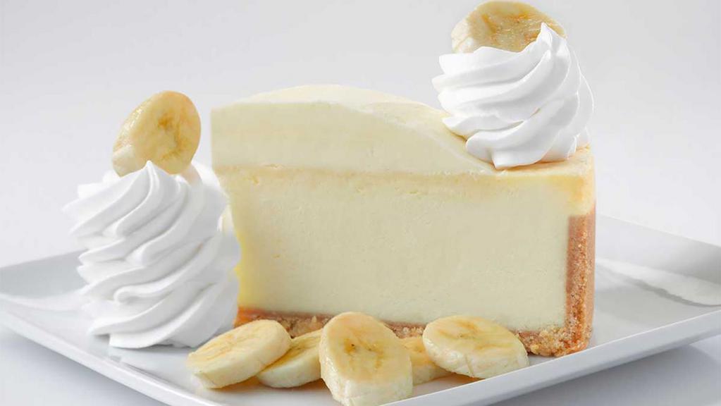 Fresh Banana Cream Cheesecake** · Banana Cream Cheesecake Topped with Bavarian Cream and Fresh Sliced Banana
