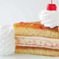 Pineapple Upside-Down Cheesecake** · Pineapple Cheesecake Between Two Layers of Moist Buttery Pineapple Upside-Down Cake
