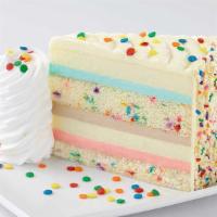 Celebration Cheesecake · Layers of Vanilla Cake, Cheesecake, Strawberry, Chocolate and Vanilla Mousse with Cream Chee...