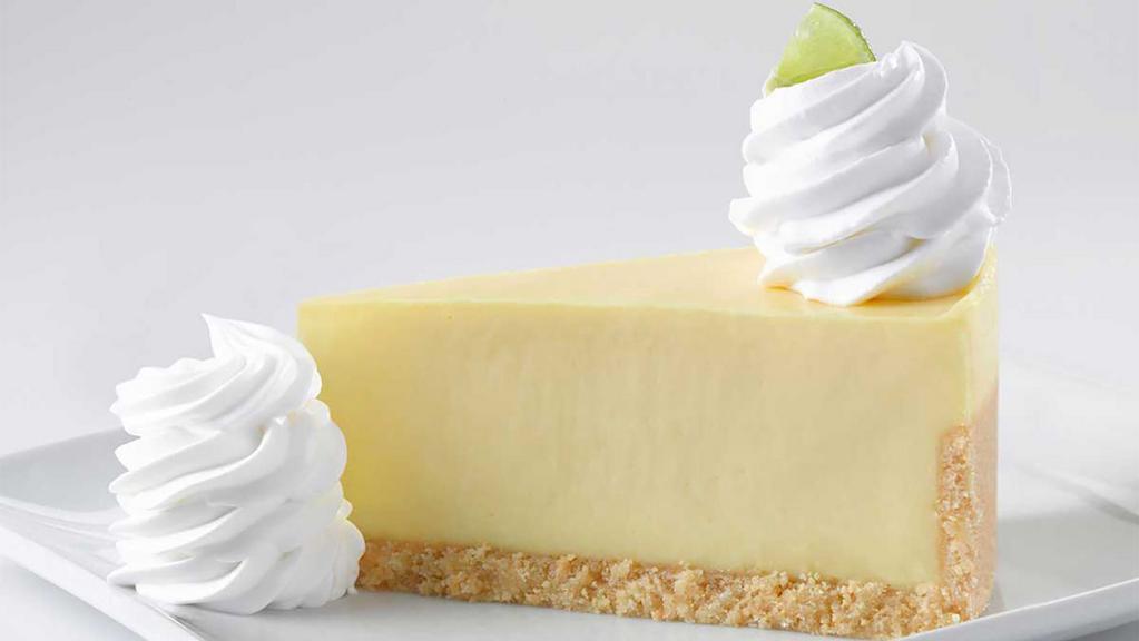 Key Lime Cheesecake · Key Lime Pie in a Cheesecake! Deliciously Tart and Creamy on a Vanilla Crumb Crust